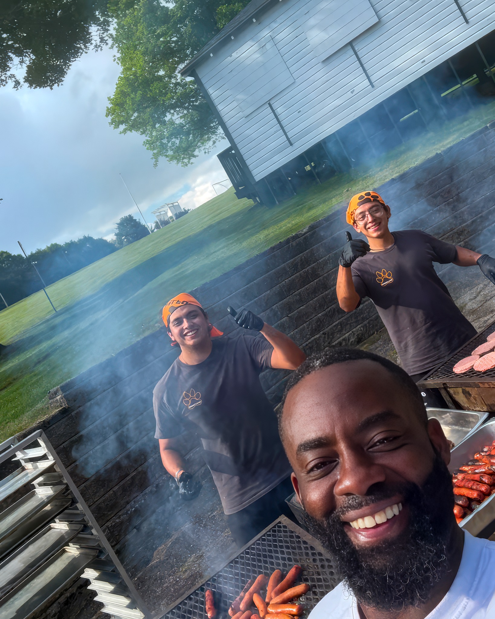WOLFoods team grilling outside